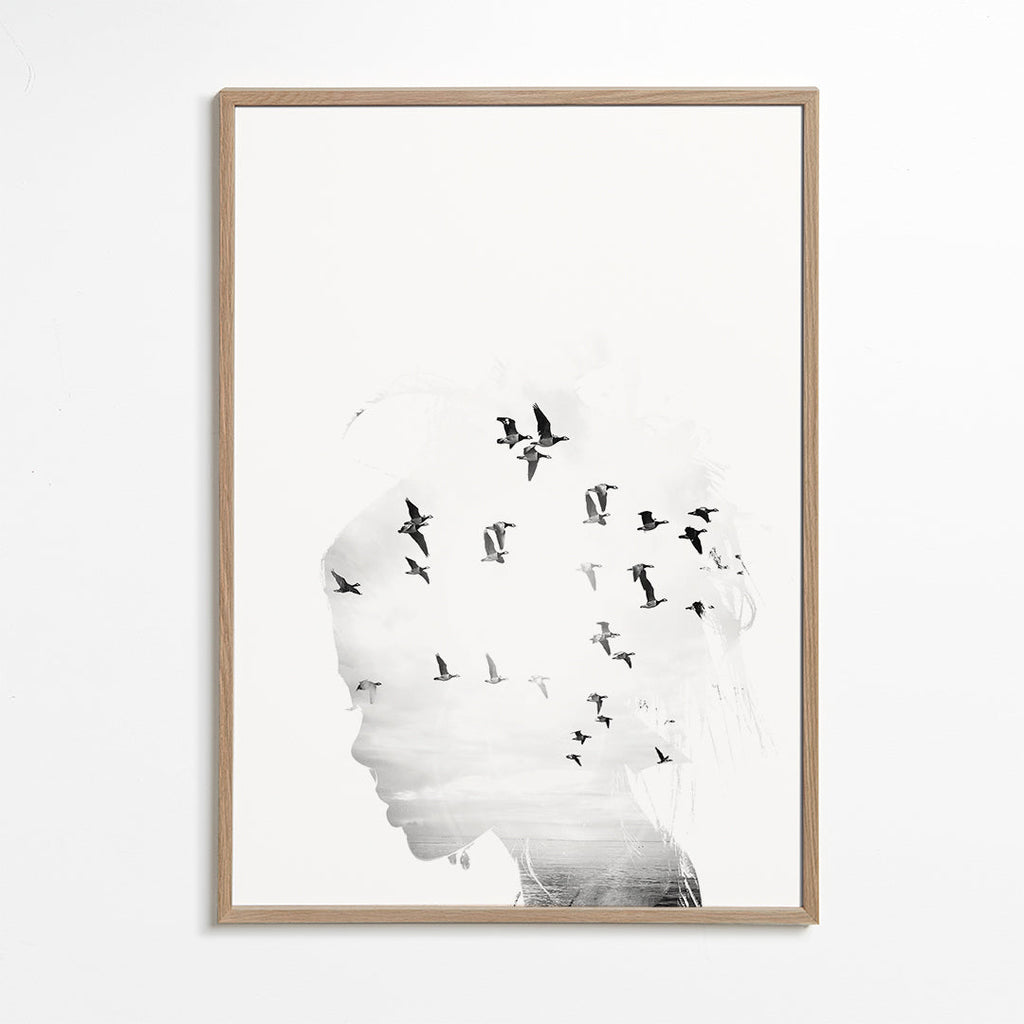 Sort-hvid kunst: profil med fugleflok