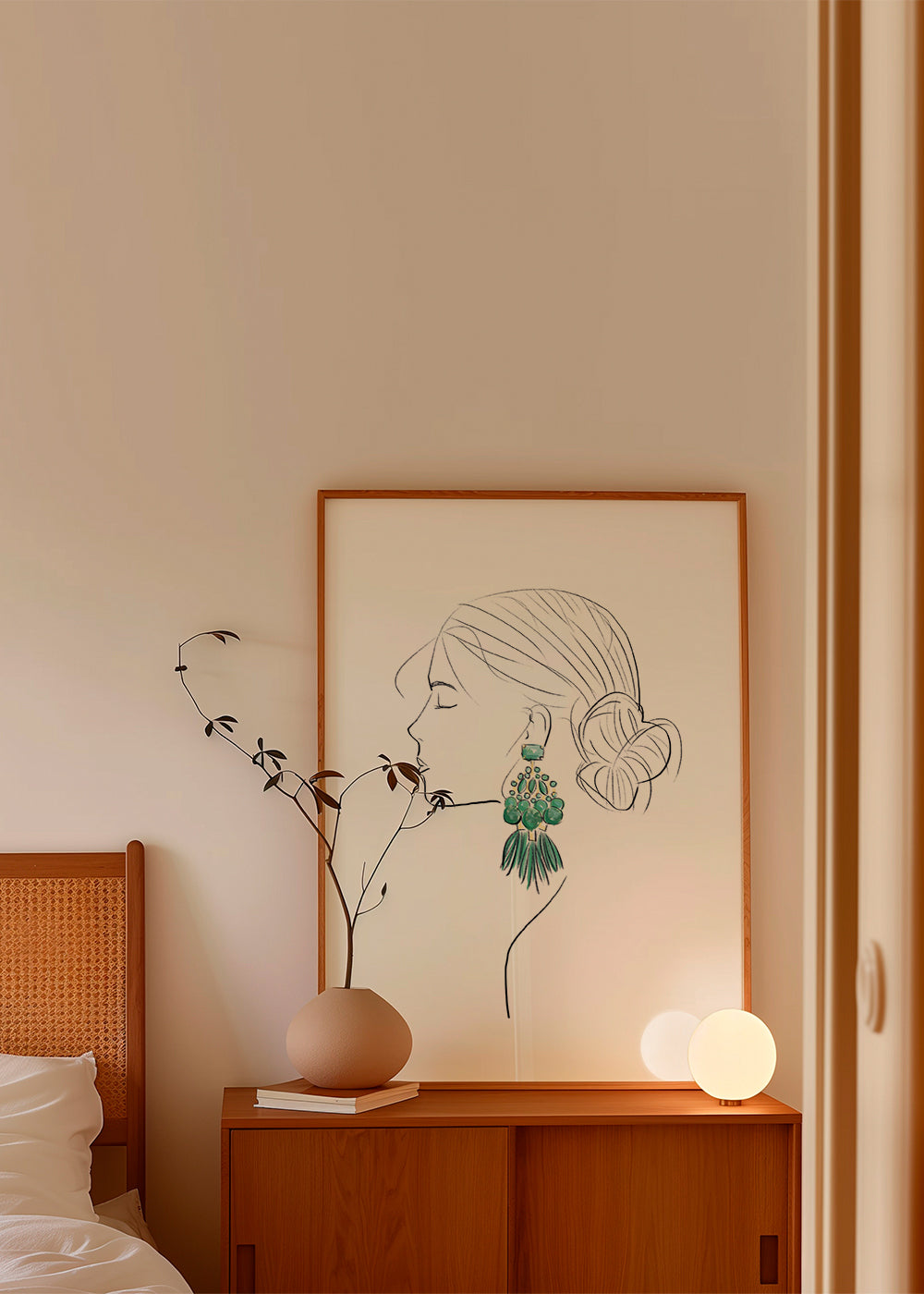 Illustration profil af kvinde med grønne øreringe