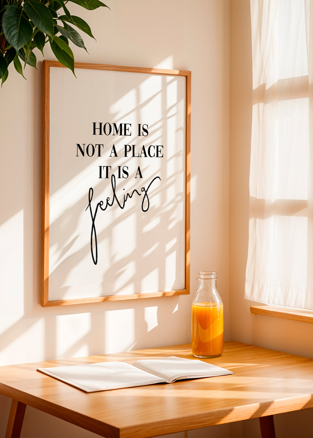 Sort-hvid typografisk citat "Home is a feeling"