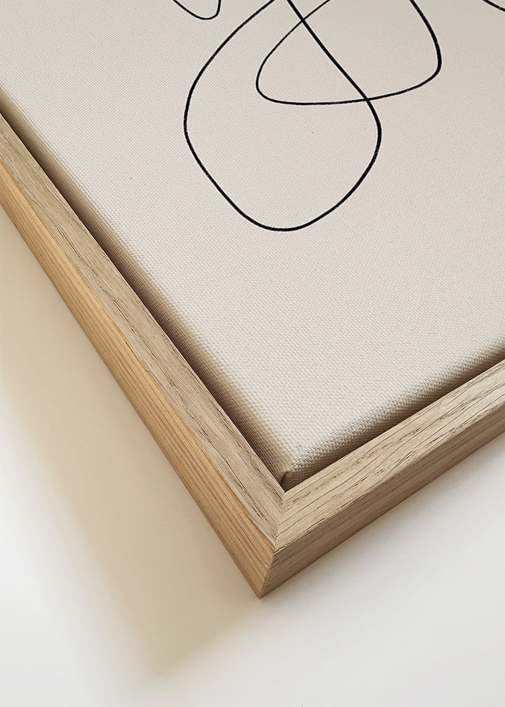 Minimalistisk design med sammenhængende linje på beige baggrund