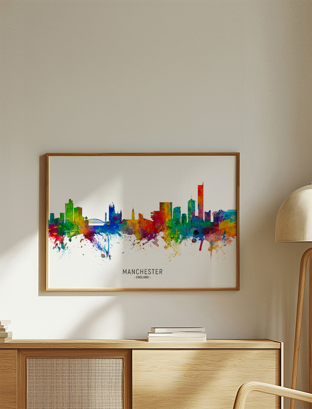 Rejseplakat: Manchester skyline i farvesprøjt