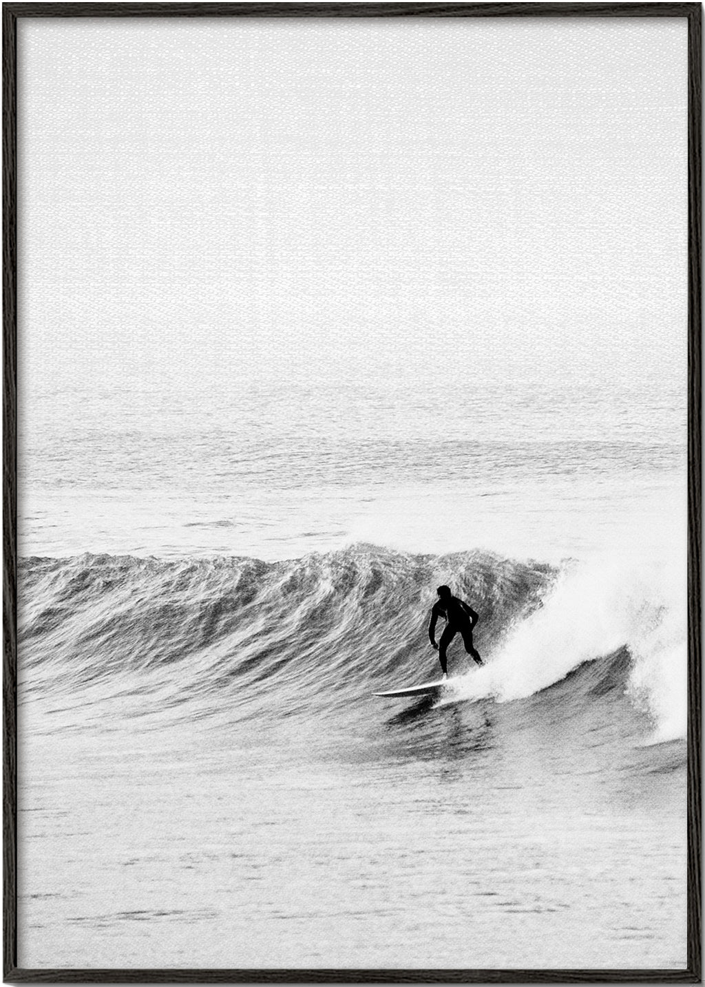 Sportkunst: surfer på bølgen