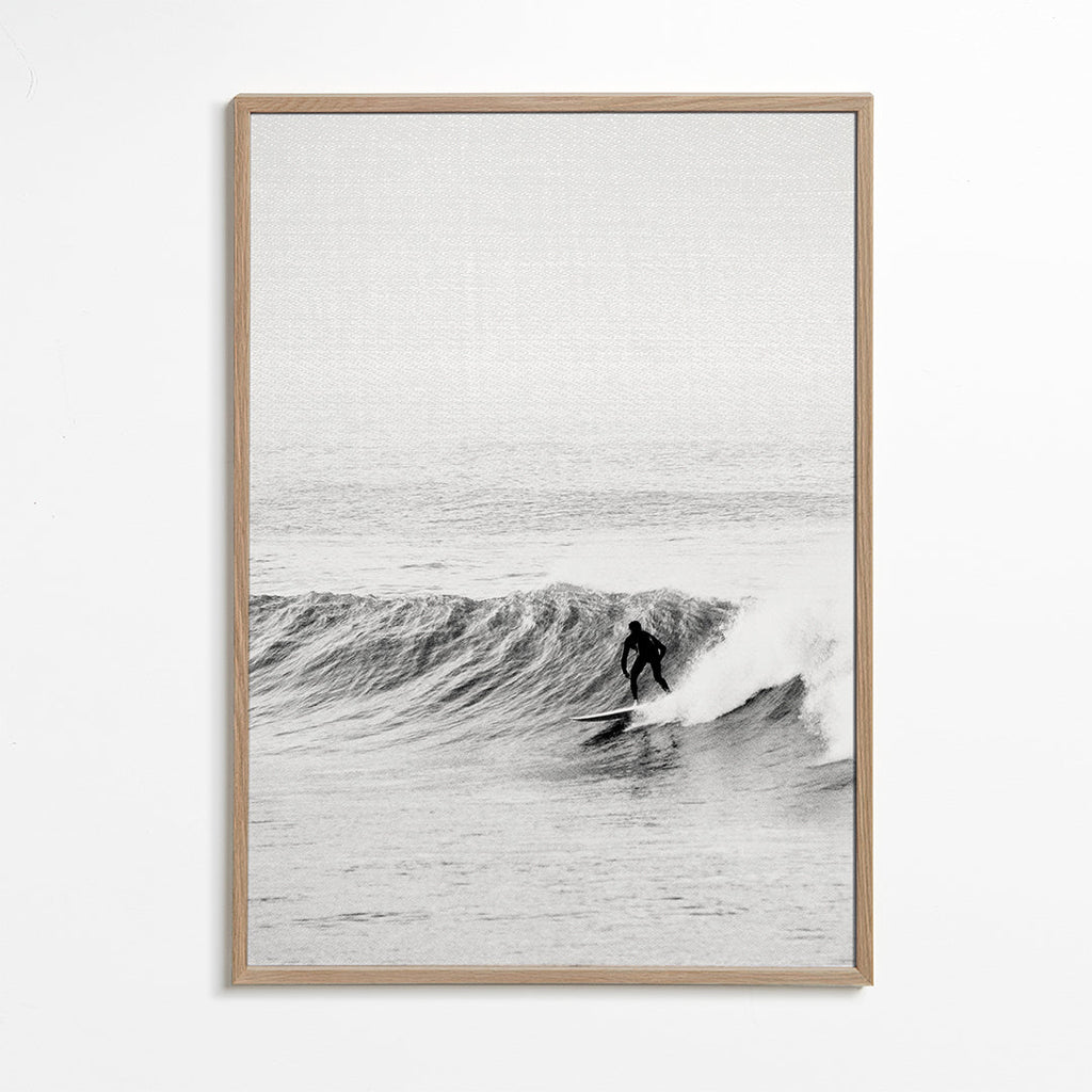 Sportkunst: surfer på bølgen