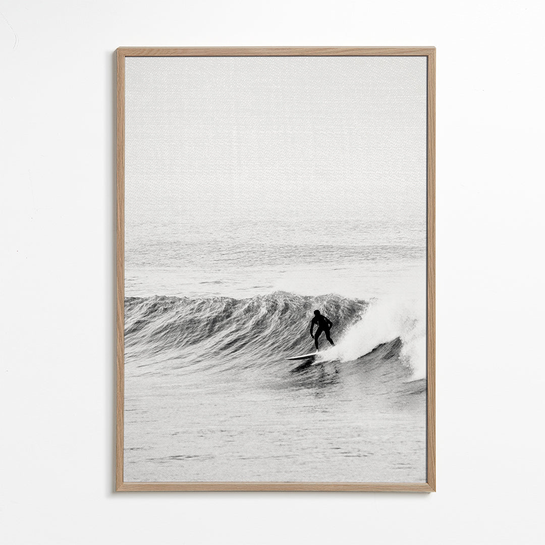 Sportkunst: surfer på bølgen