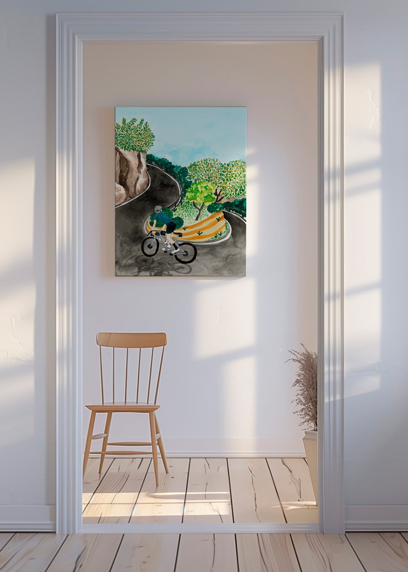 Landskabskunst med cyklist i bjergsving