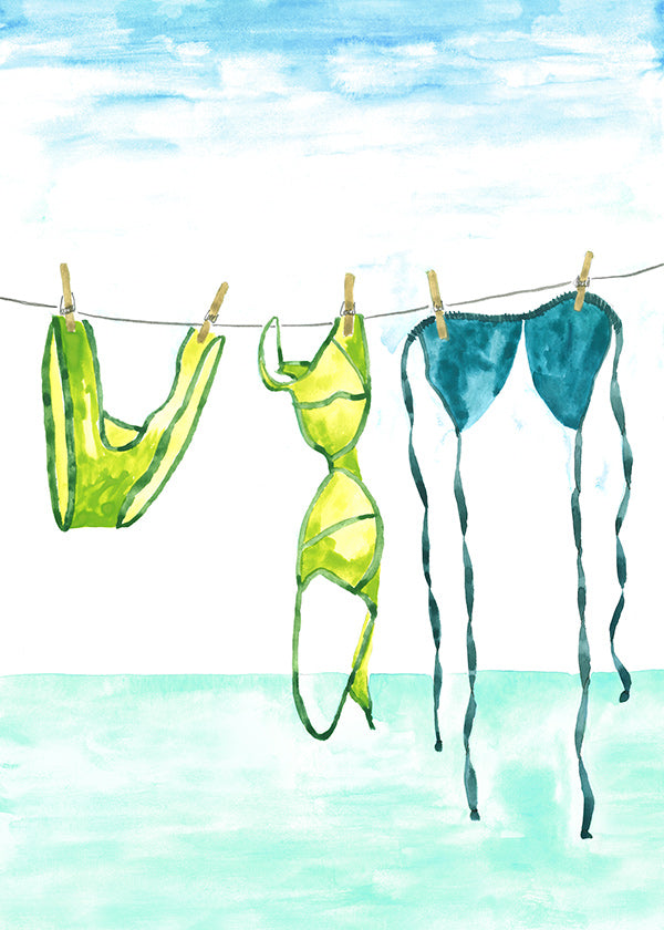 Illustration af bikinier hængt ved stranden
