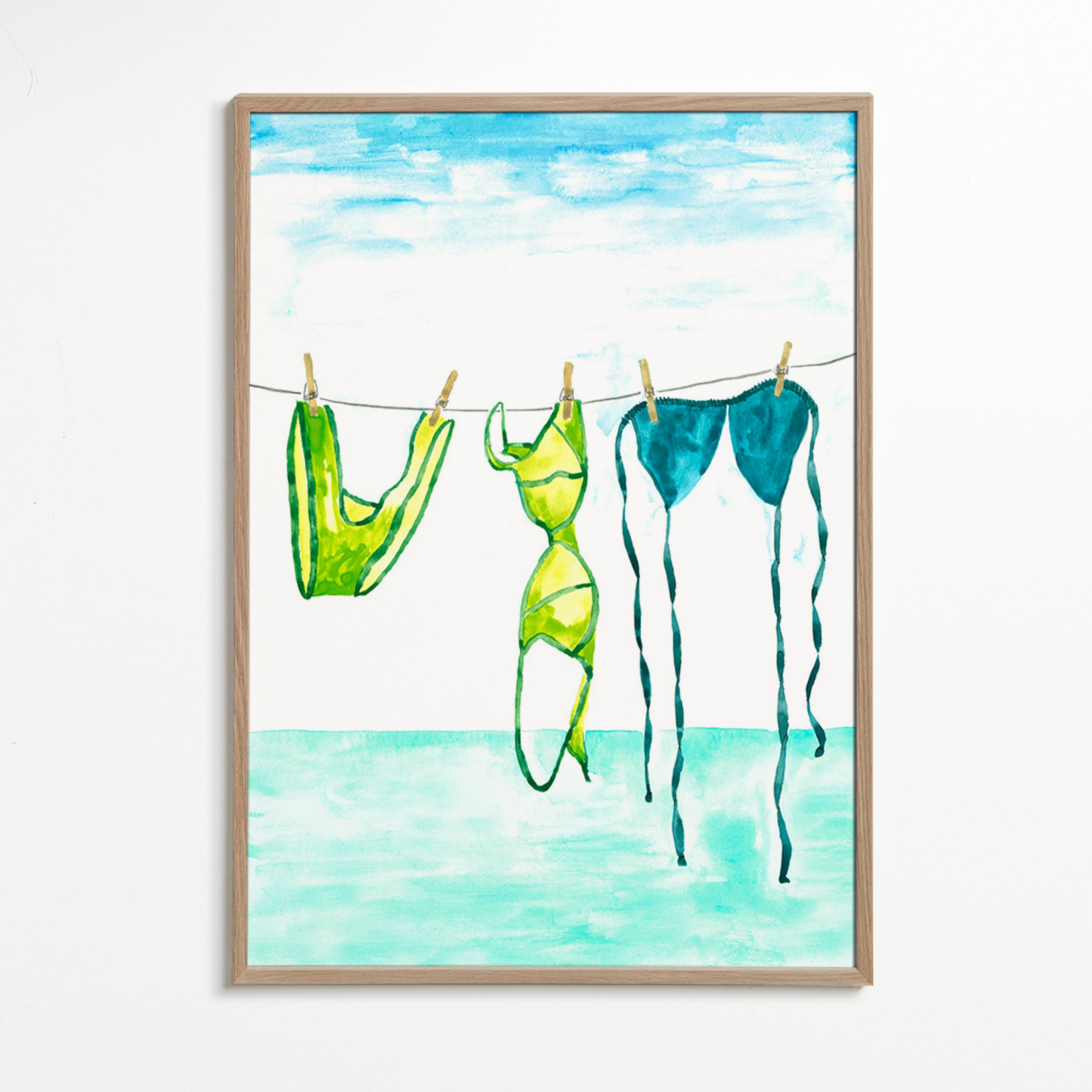 Illustration af bikinier hængt ved stranden