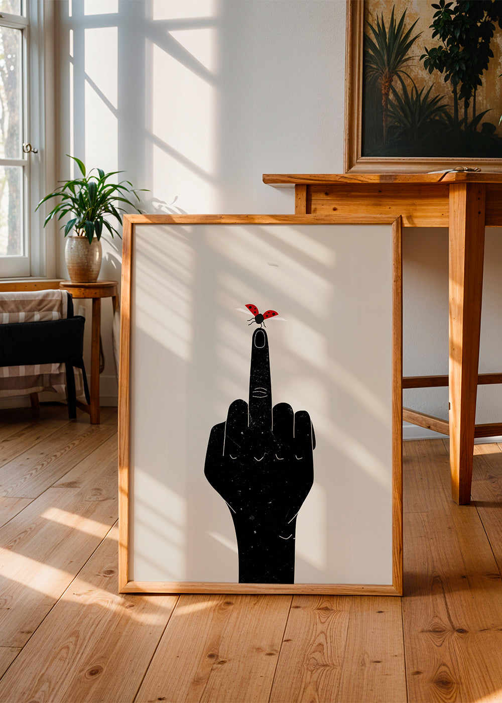Mariehøne-illustration på pegende finger