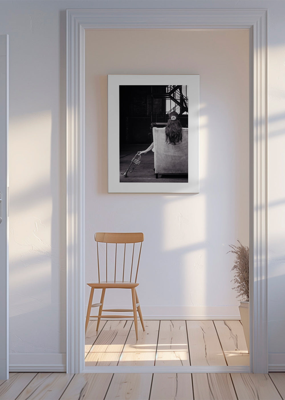 Fotografi af siddende musiker set bagfra med trompet