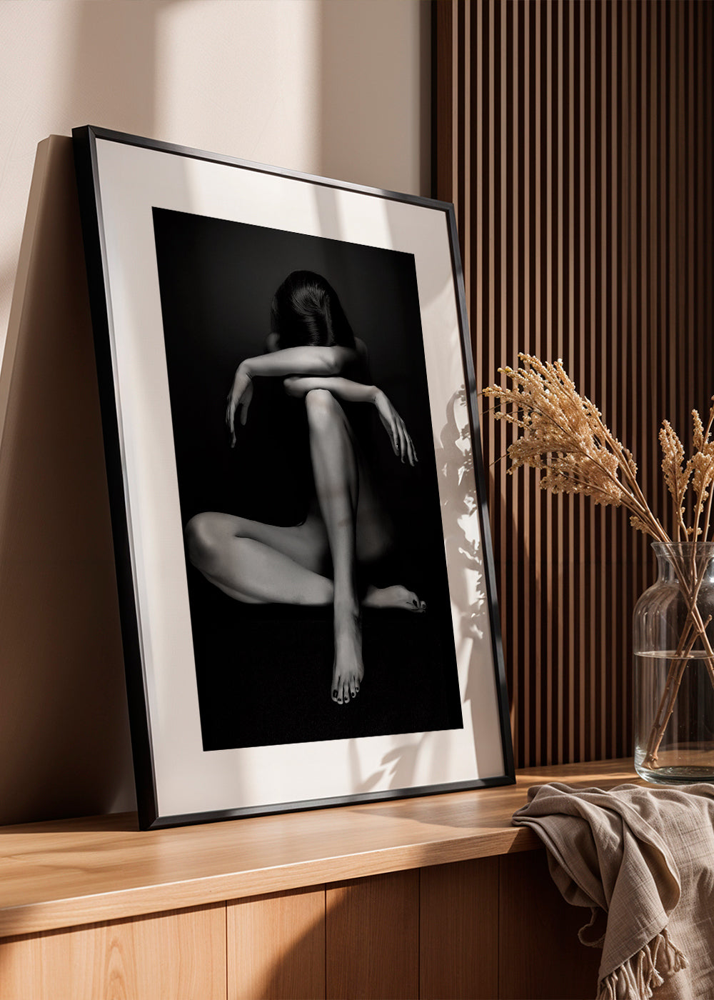 Fotografi af siddende figur i studie