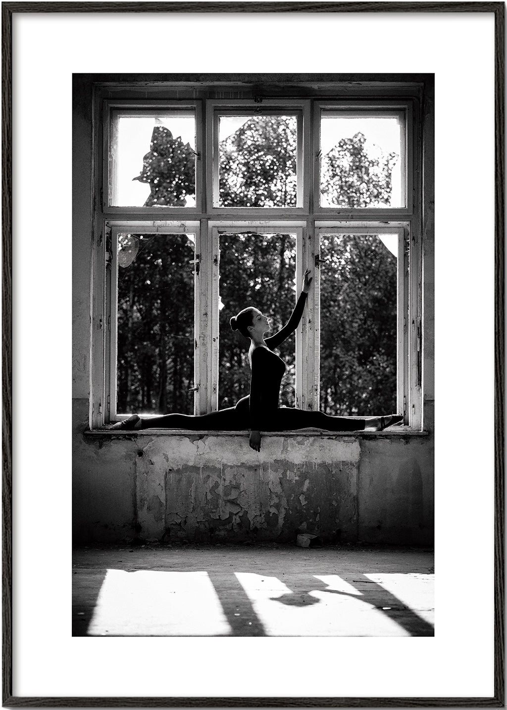 Fotografi af ballerina i vinduet
