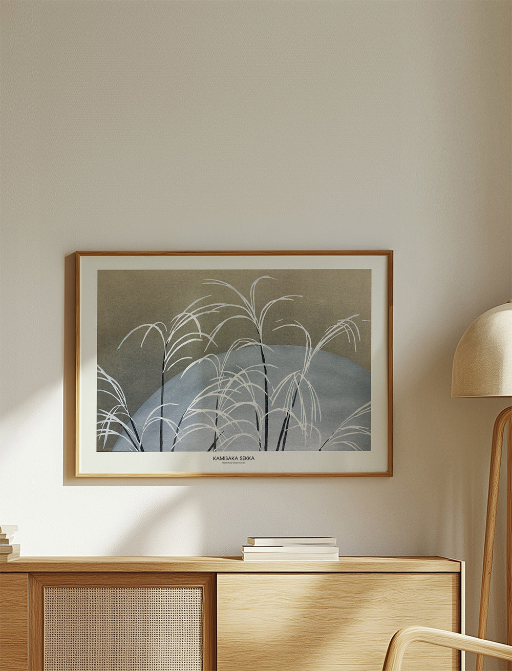 Botanisk plakat: hvide siv foran blå bakke
