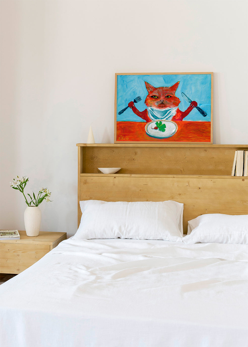Køkkenkunst: kat ved bordet