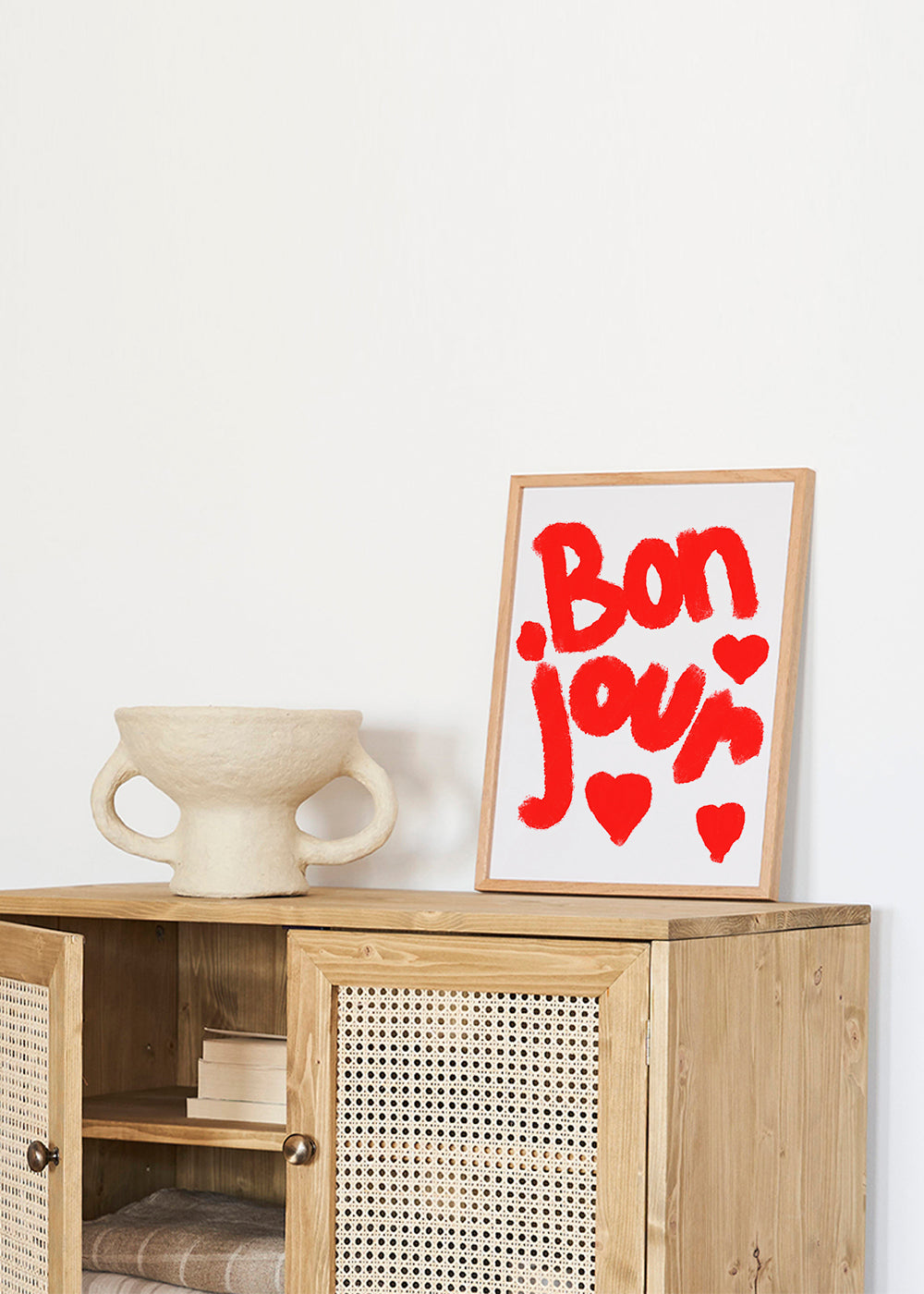 Illustration 'Bonjour' med røde hjerter