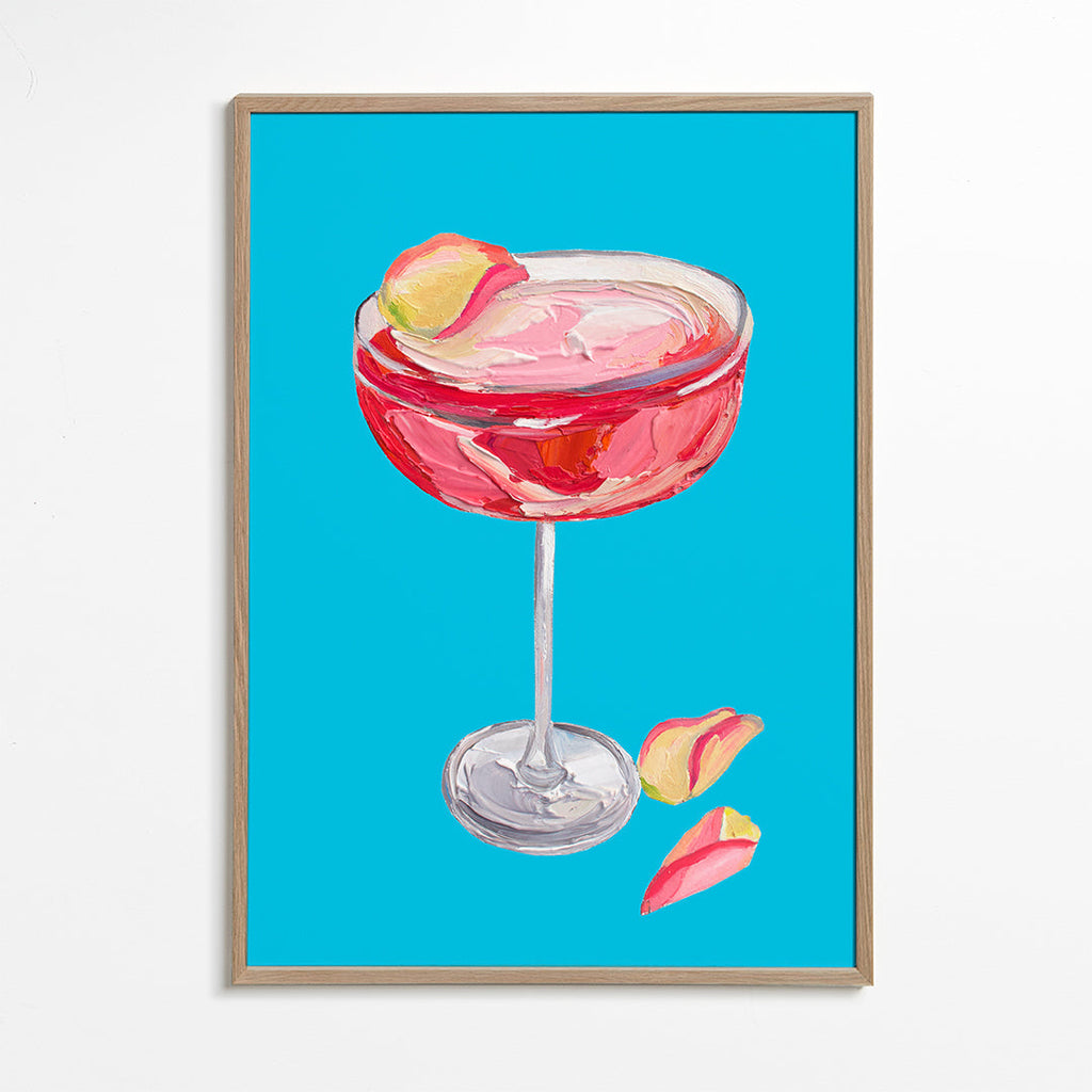 Køkkenkunst Rosa gin-cocktail på turkis