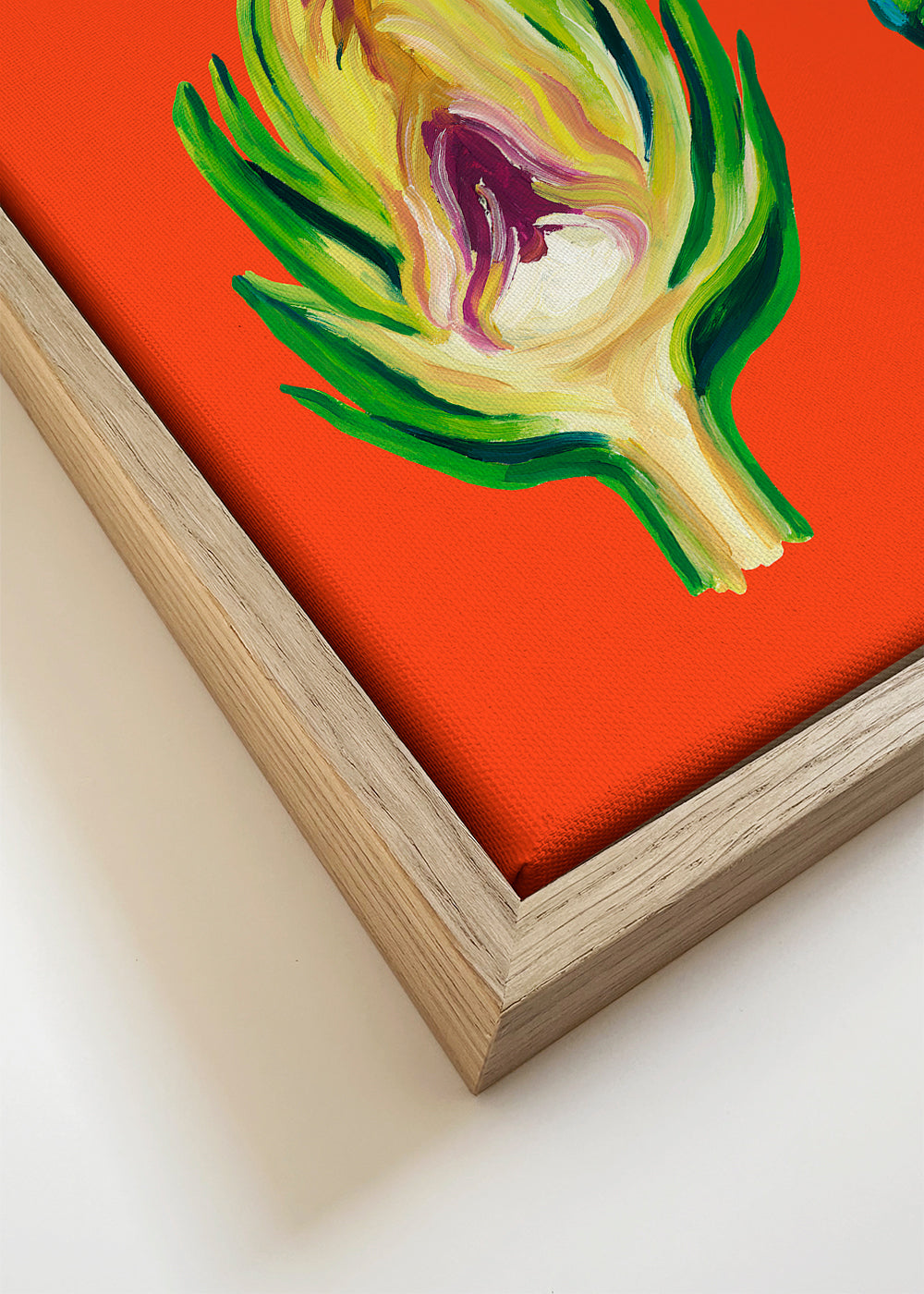 Køkkenkunst med artiskokker på orange baggrund