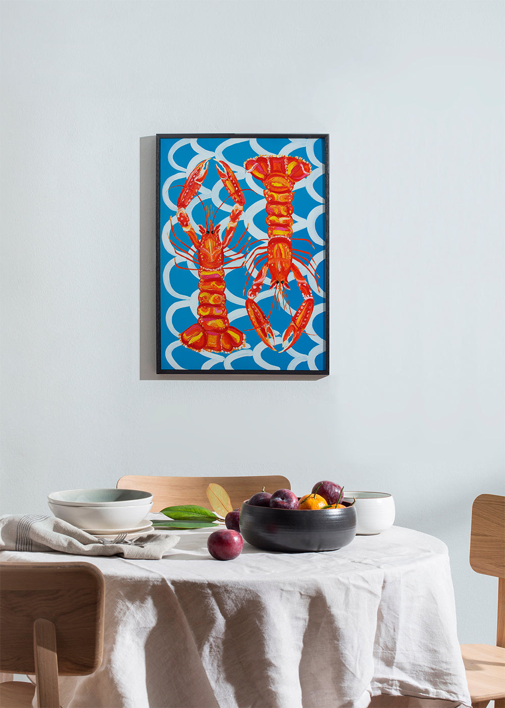 Køkkenkunst med hummere på blå