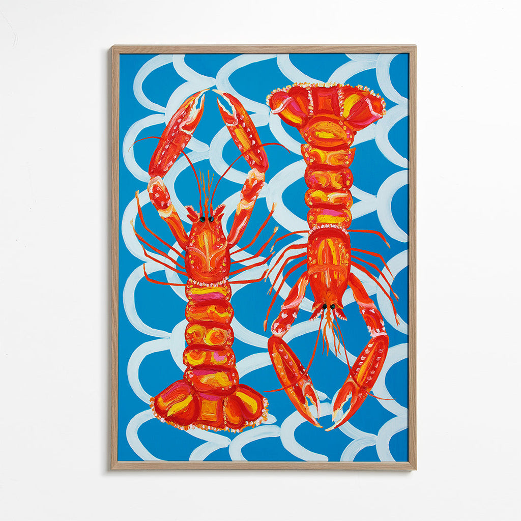 Køkkenkunst med hummere på blå