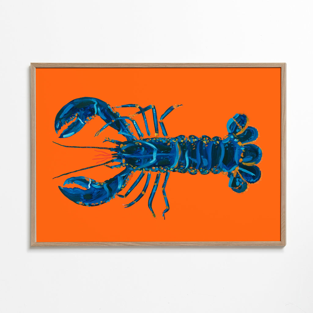 Køkkenkunst: blå hummmer på orange
