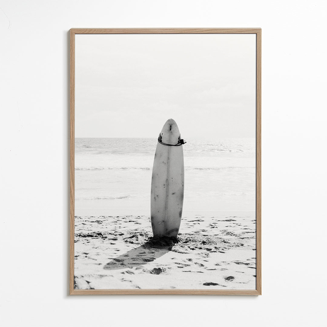 Sportkunst: surfbræt på stranden