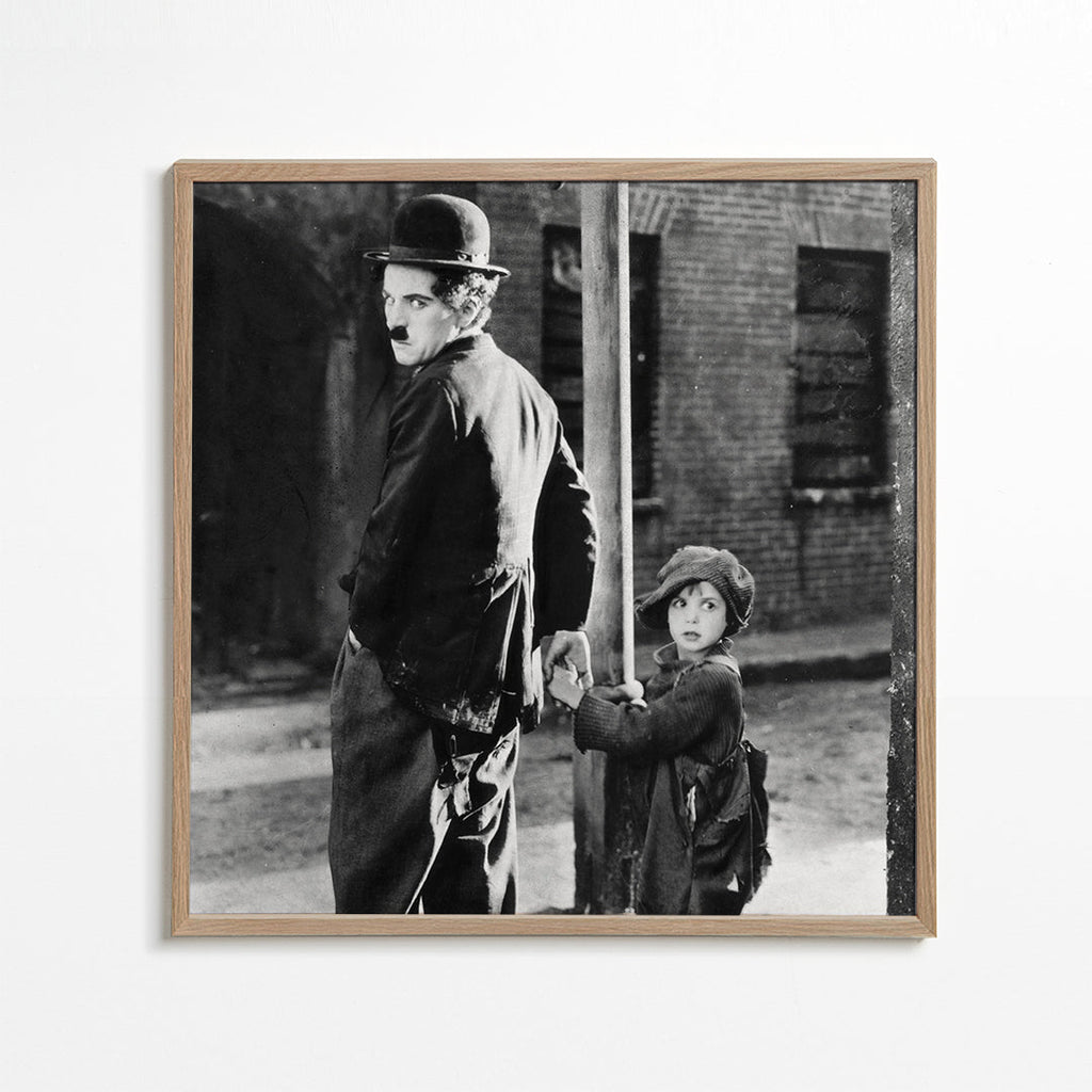 Vintage-portræt: mand med bowlerhat og barn