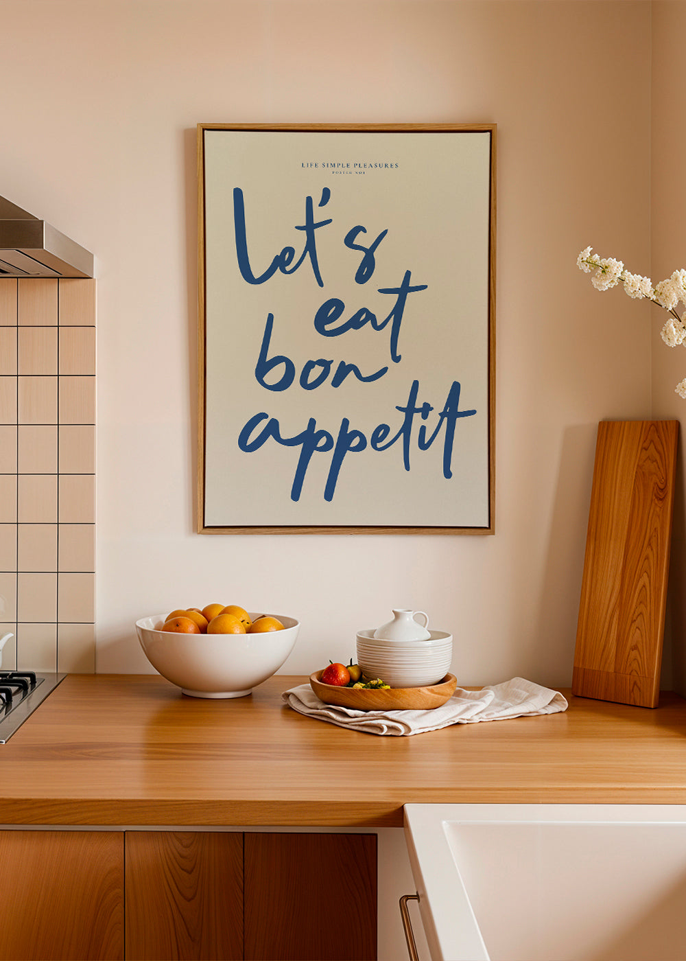 Køkkenkunst med fed blå skrift