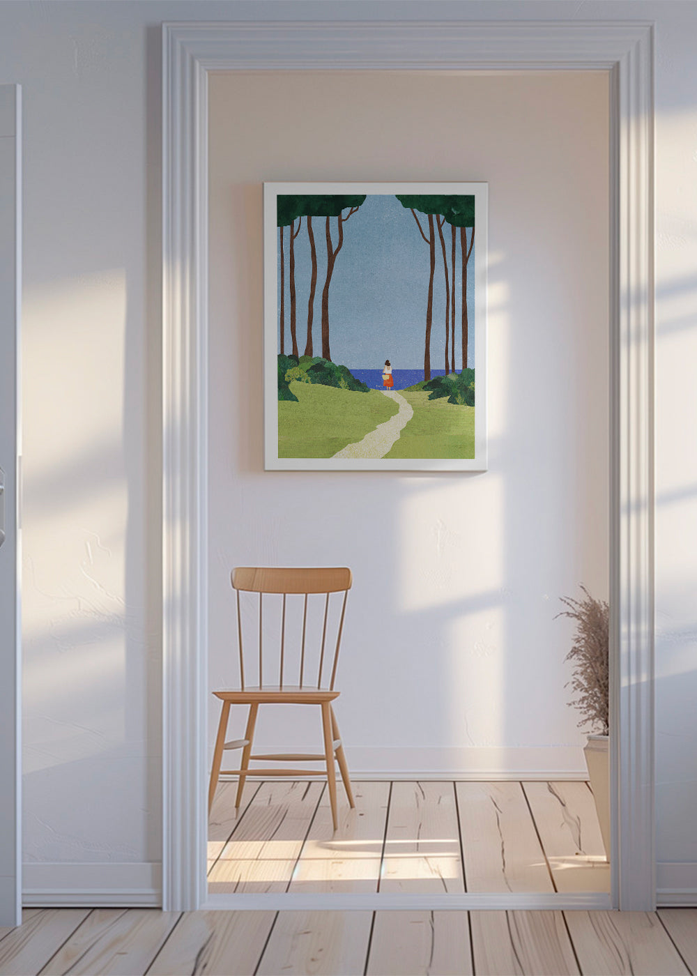 Landskabsbillede med figur ved kysten