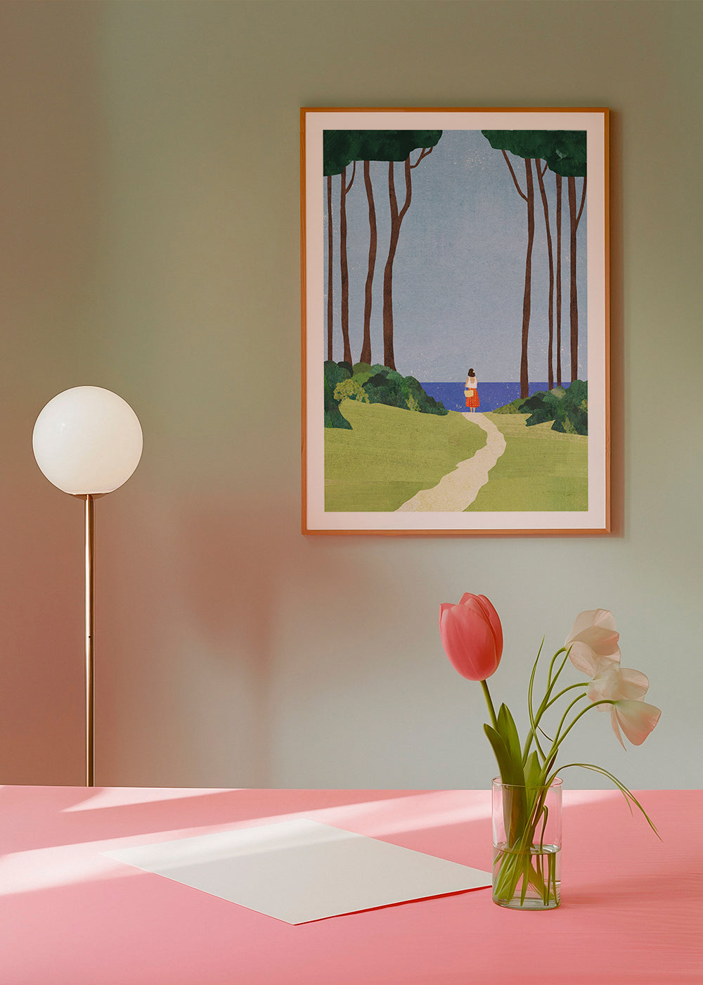 Landskabsbillede med figur ved kysten