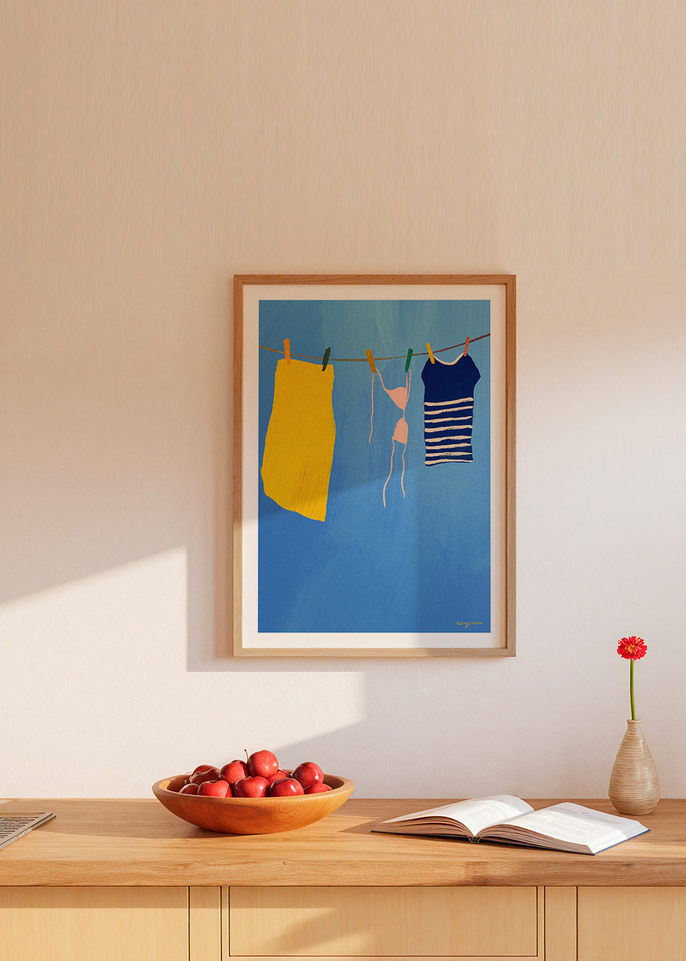 Illustration vasketøj på snor mod blåt baggrund