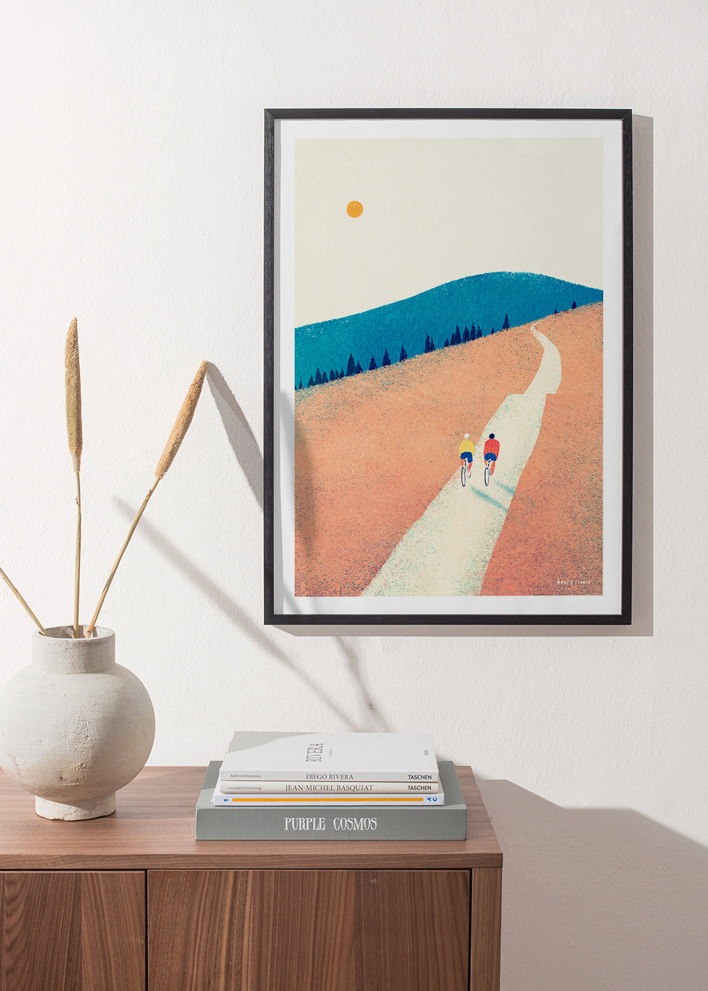 Køkkenkunst med to cyklister på solbeskinnet sti – Product1