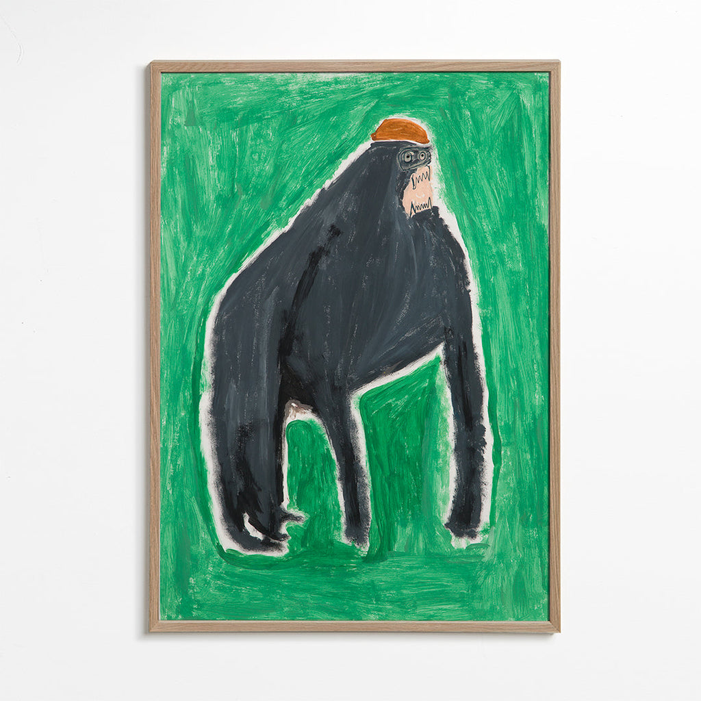 Billede gorilla udtryksfuld på grøn baggrund