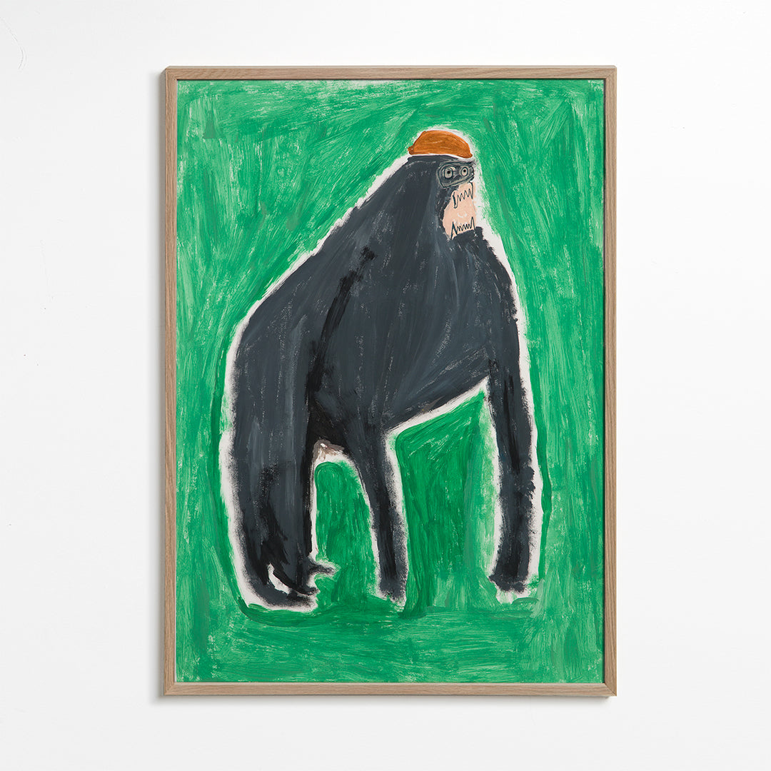 Billede gorilla udtryksfuld på grøn baggrund