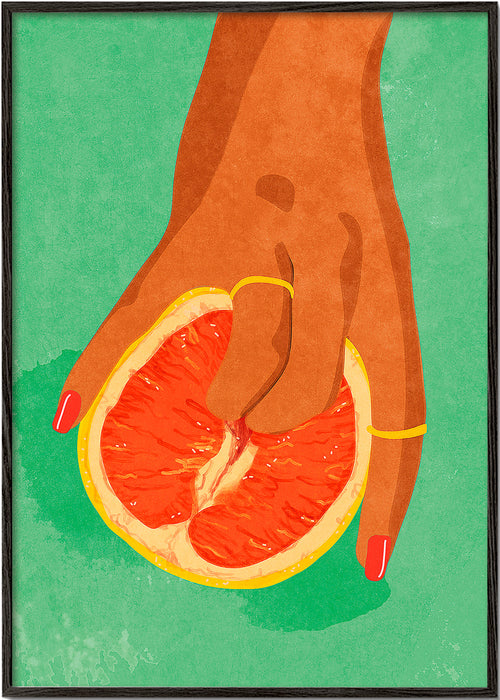 Køkkenkunst med grapefrugt og hånd