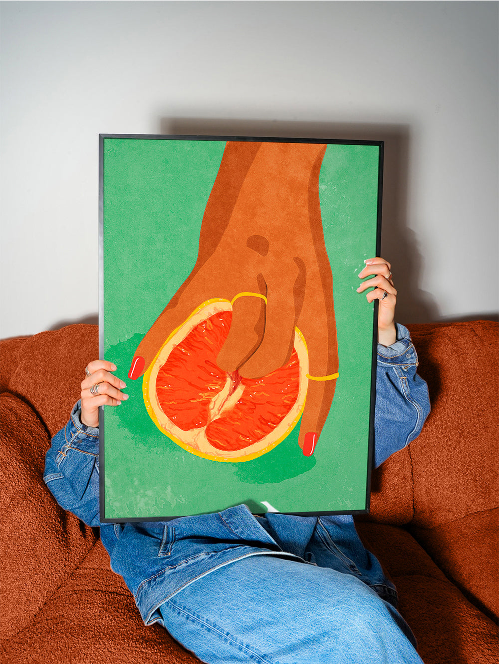 Køkkenkunst med grapefrugt og hånd