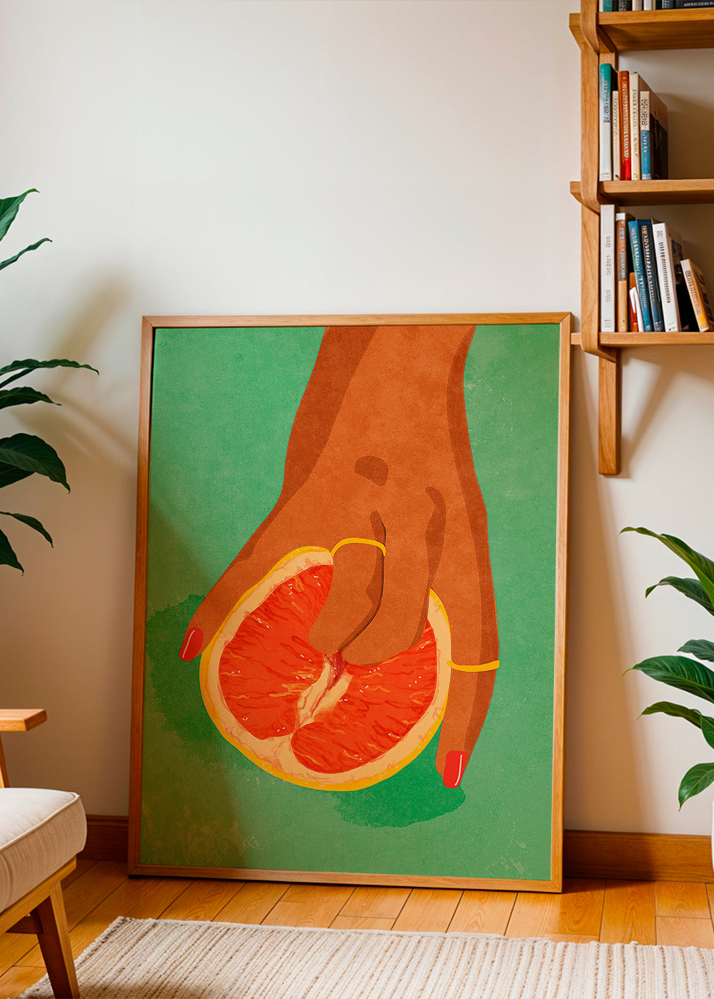 Køkkenkunst med grapefrugt og hånd