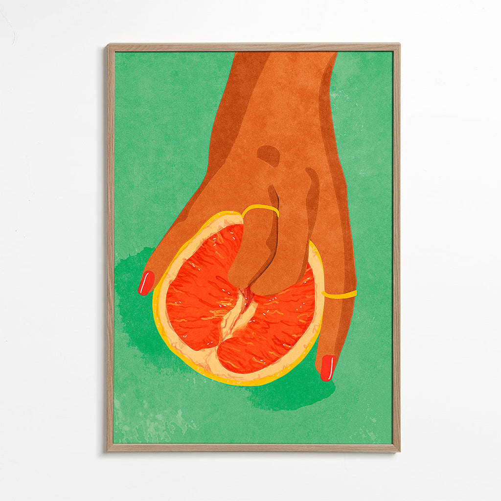 Køkkenkunst med grapefrugt og hånd