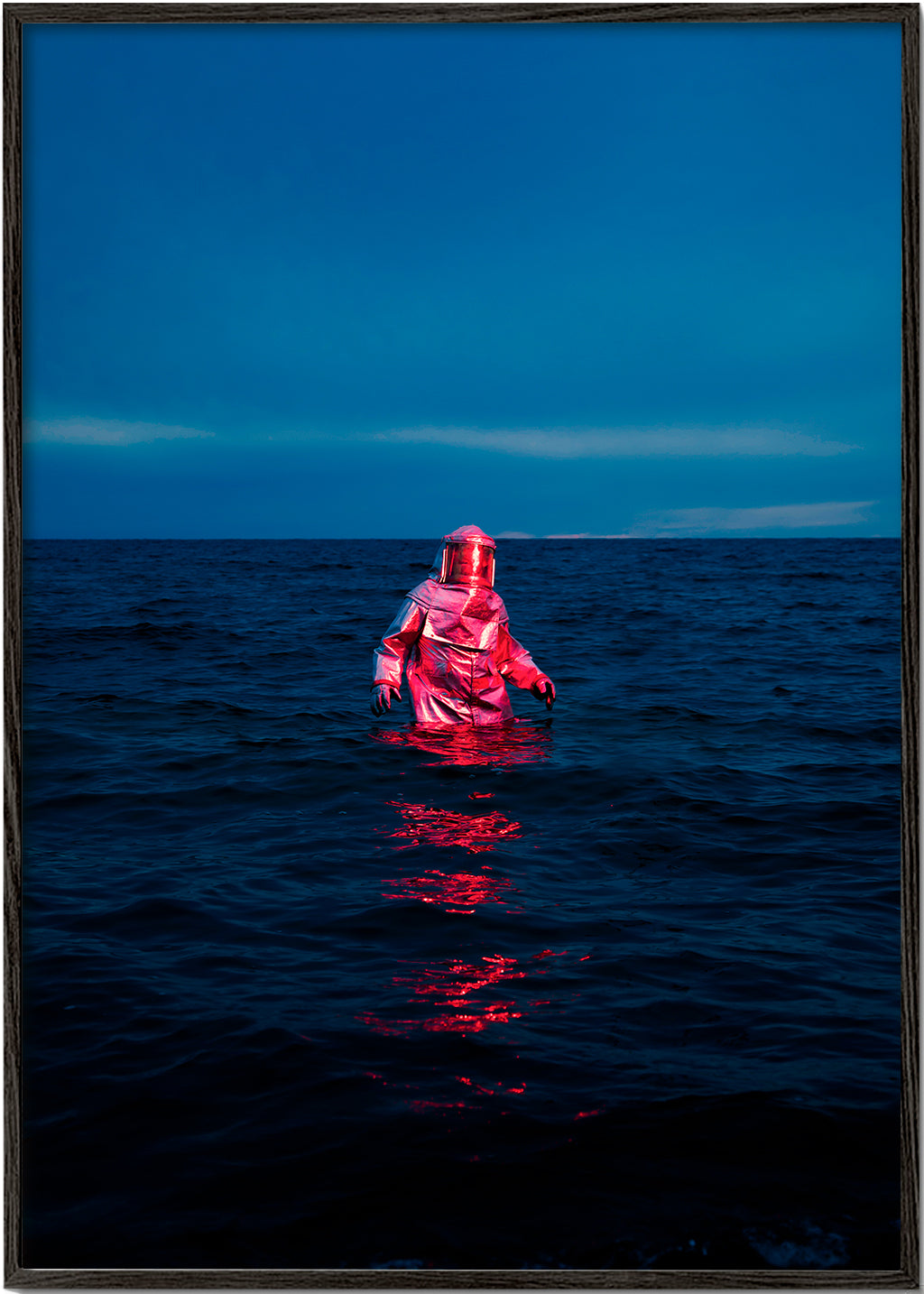 Landskabsbillede med astronaut i havet