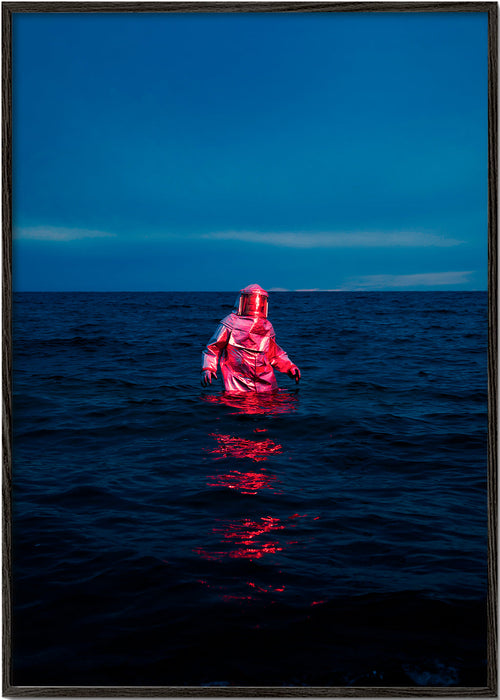 Landskabsbillede med astronaut i havet