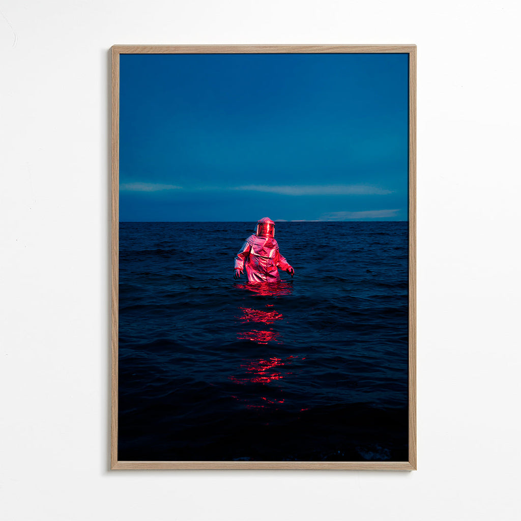 Landskabsbillede med astronaut i havet