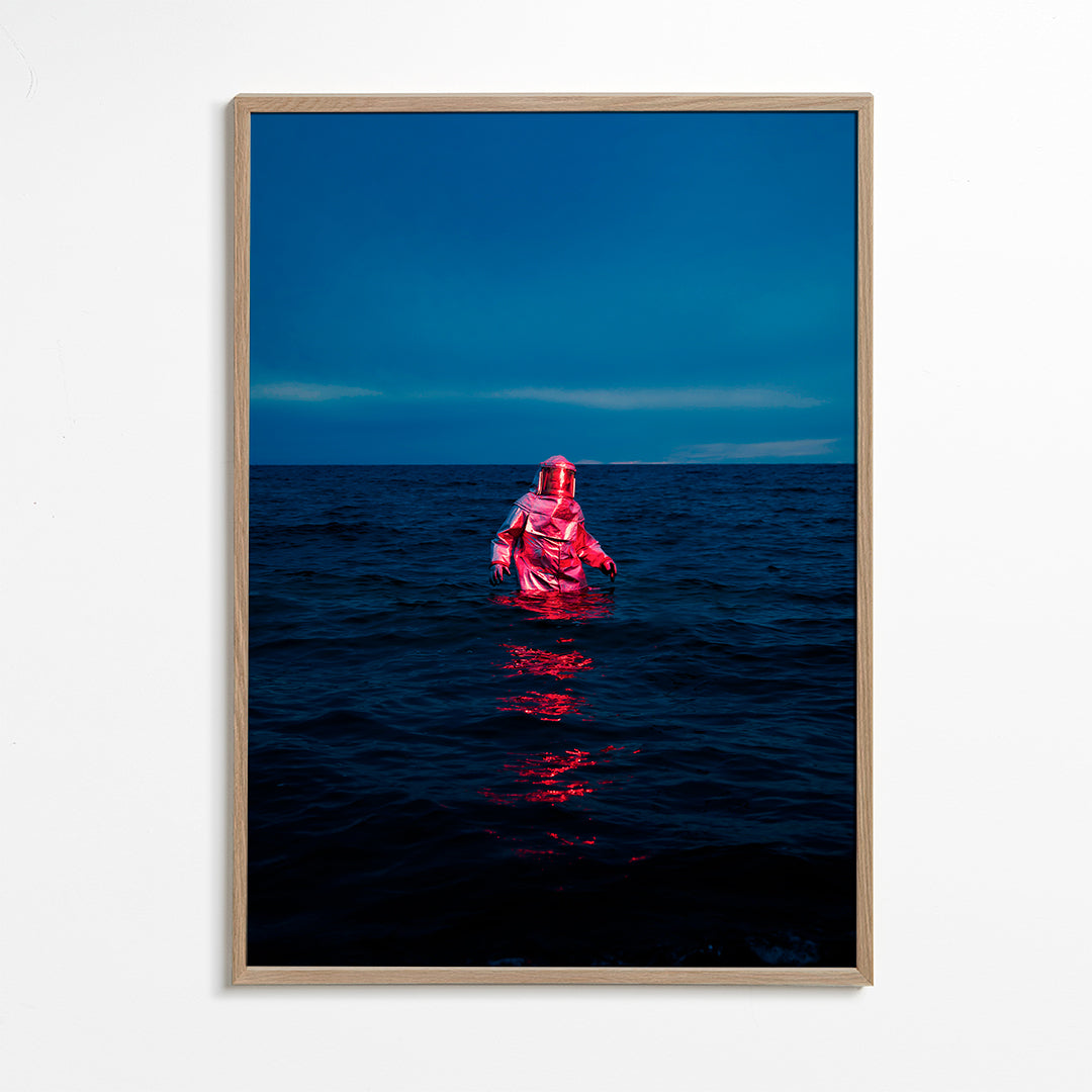 Landskabsbillede med astronaut i havet