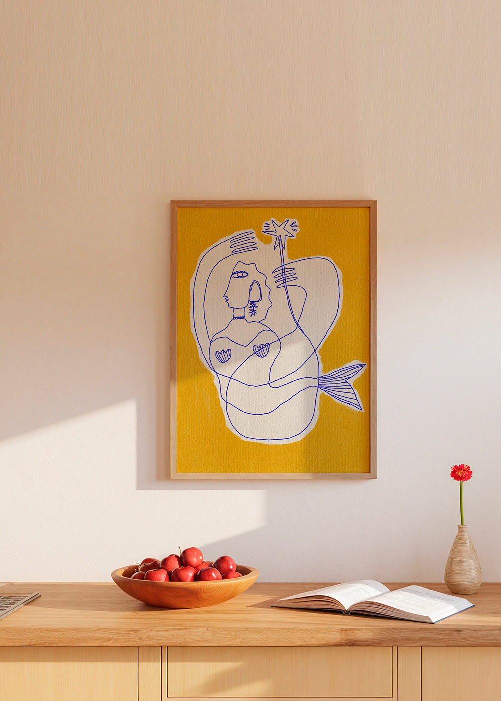Havfrue stregillustration på gul