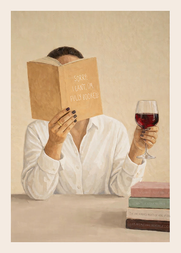 Køkkenkunst: kvinde læser med glas vin