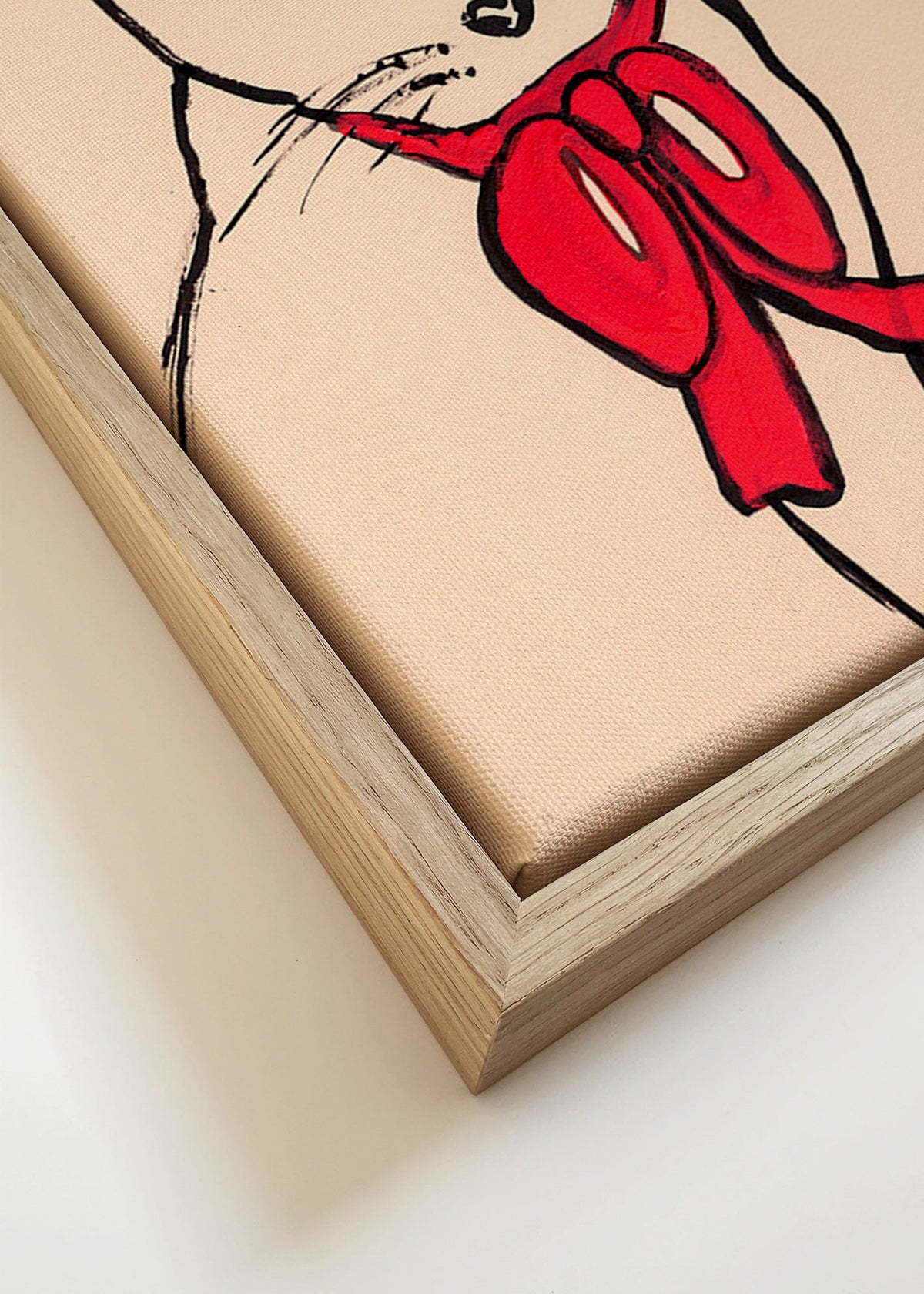 Kat billede med rød sløjfe og løs streg – Canvas detail