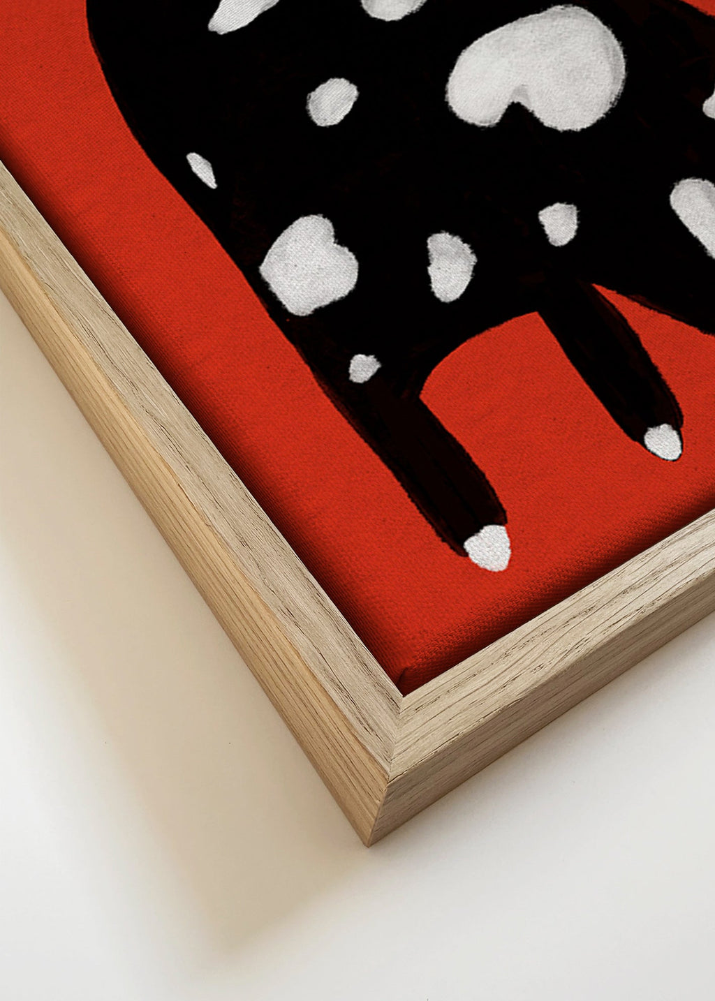Kat med pletter på rød baggrund – Canvas detail
