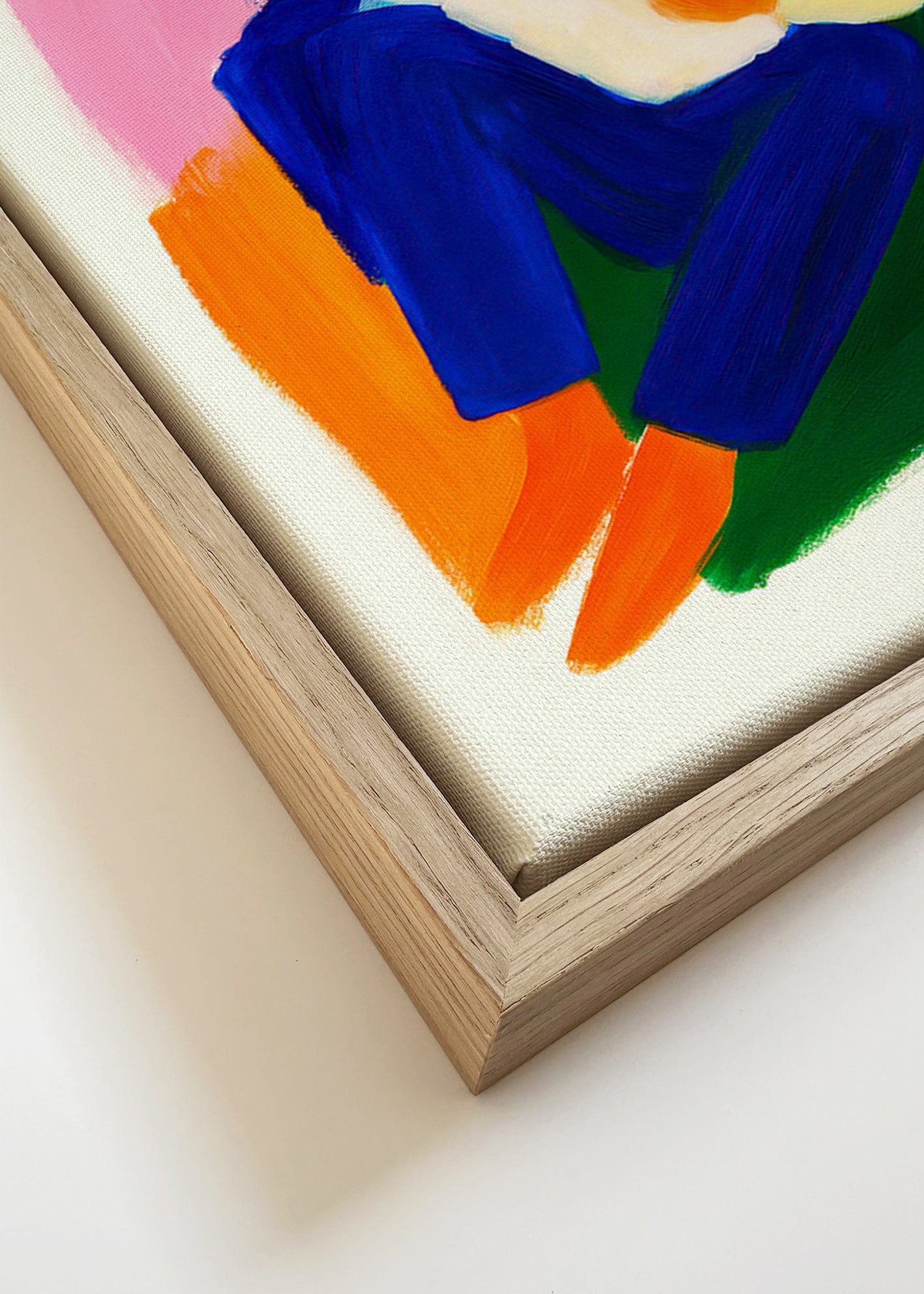 Illustration af siddende figur i klare farver – Canvas detail