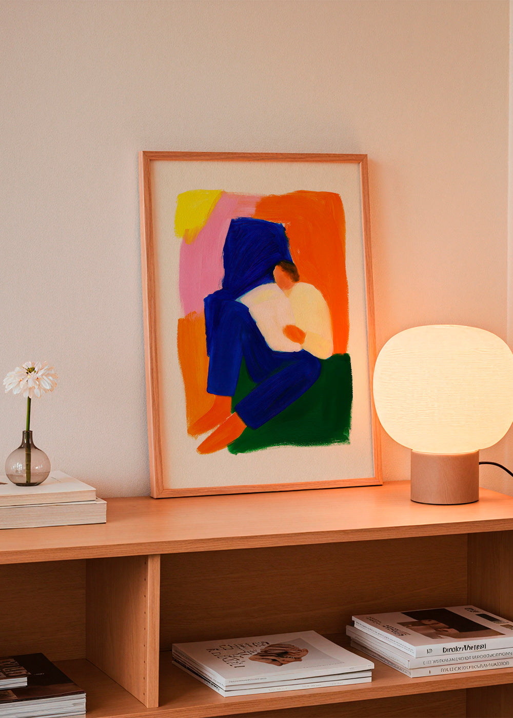 Illustration af siddende figur i klare farver – Product3