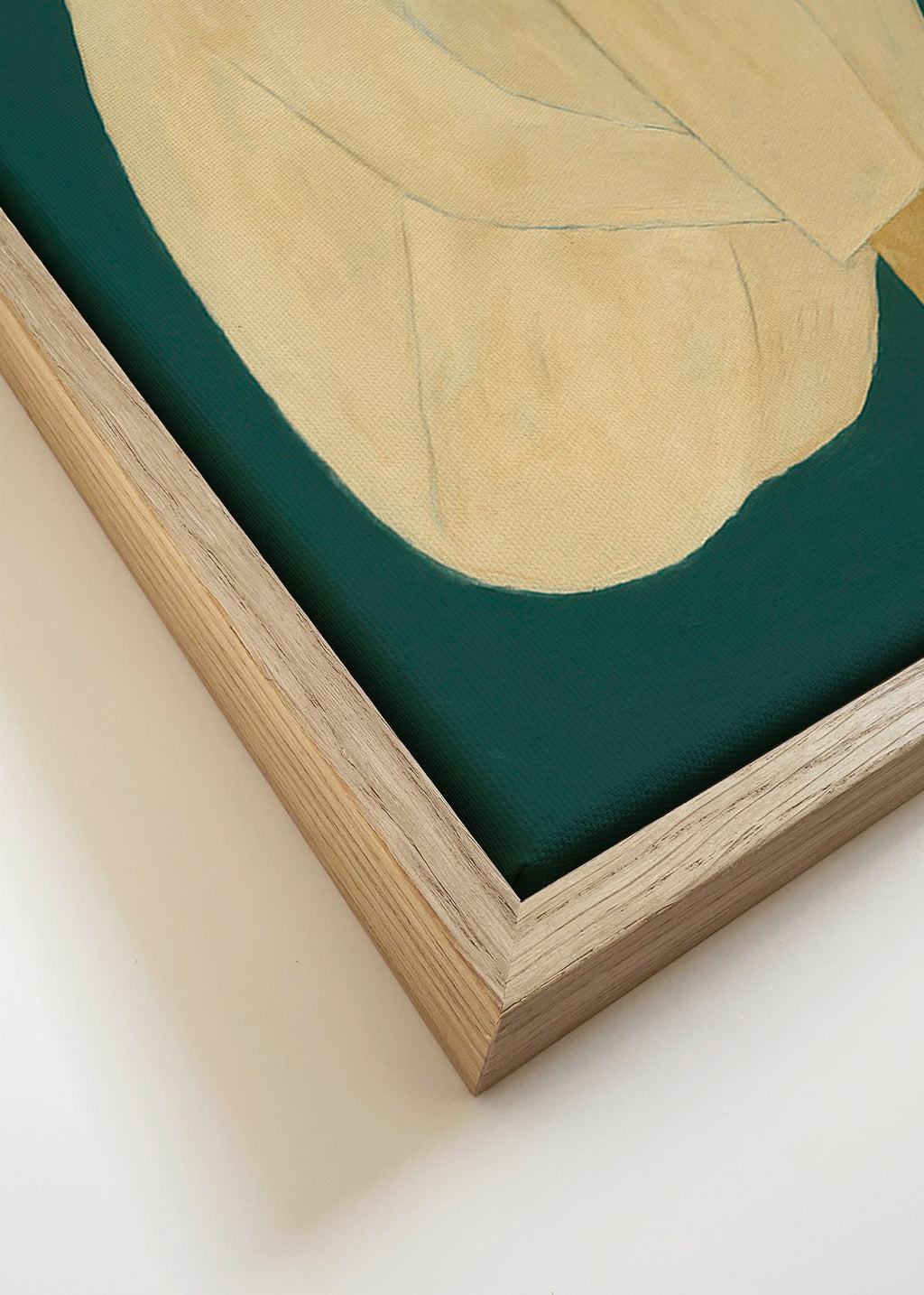 Minimalistisk billede med siddende figur på grøn baggrund – Canvas detail
