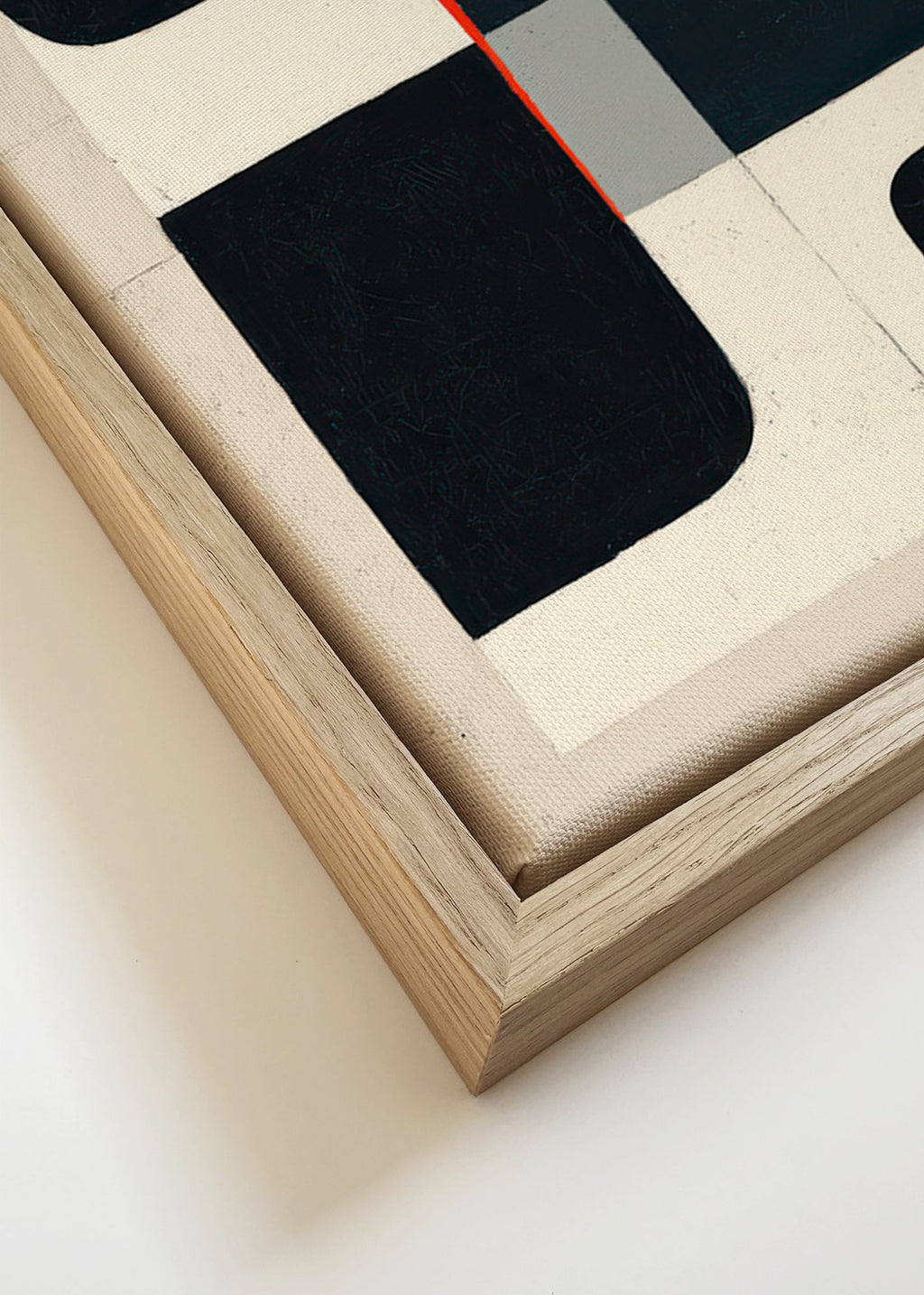 Geometrisk plakat med sorte blokke og rødt accent – Canvas detail