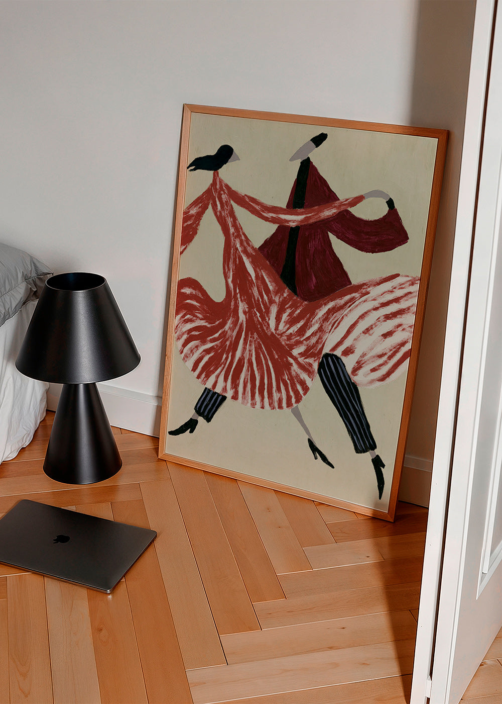Abstrakt kunstværk med dansende figurer