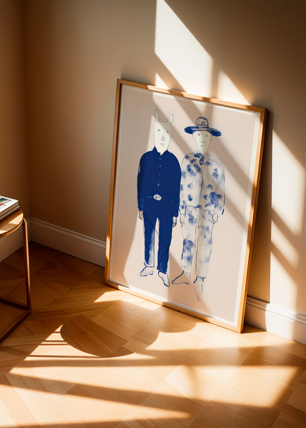 Illustration af to figurer med kanin i blå blæk